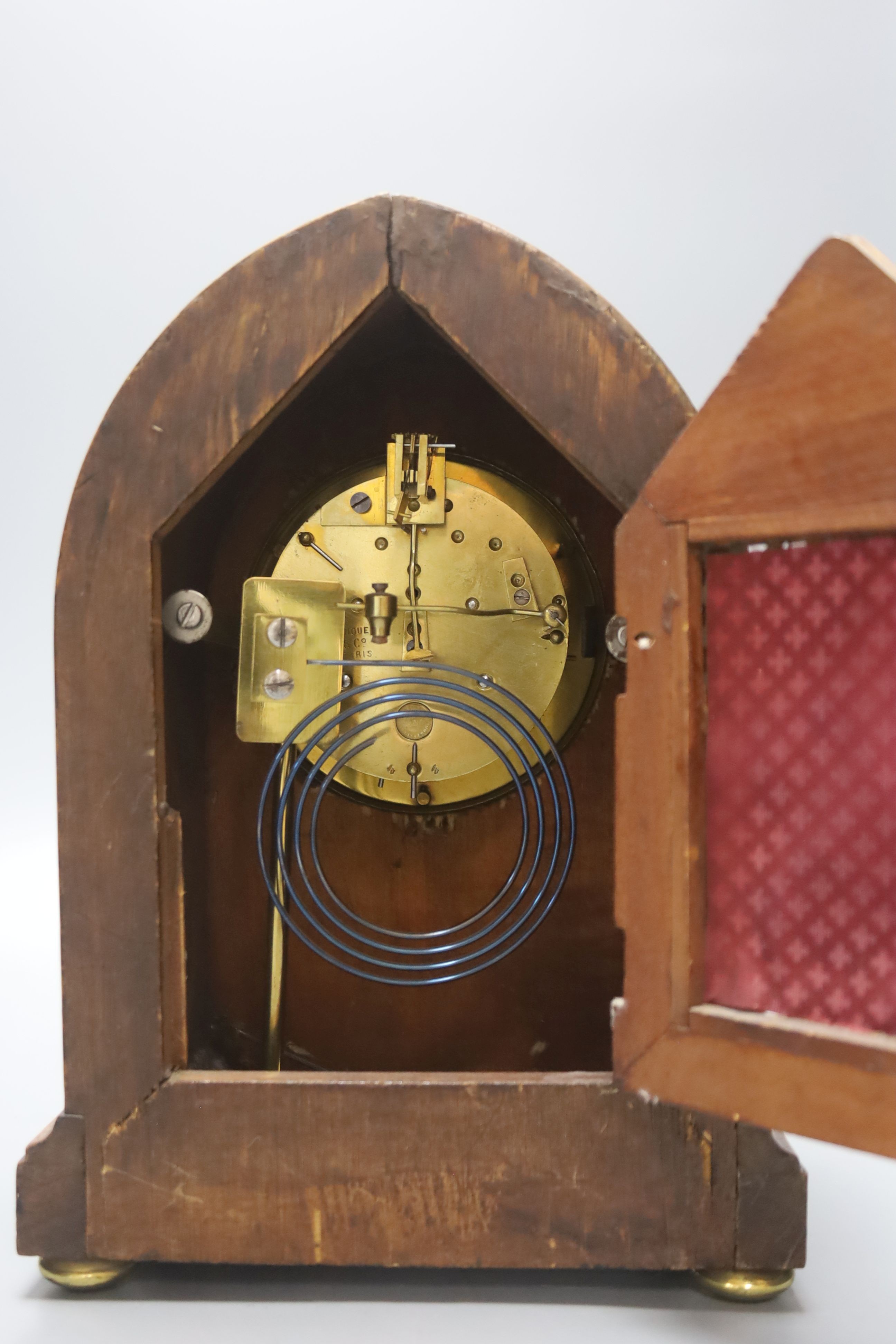 A mahogany and marquetry mantel clock, 26cm high (af) pendulum, no key